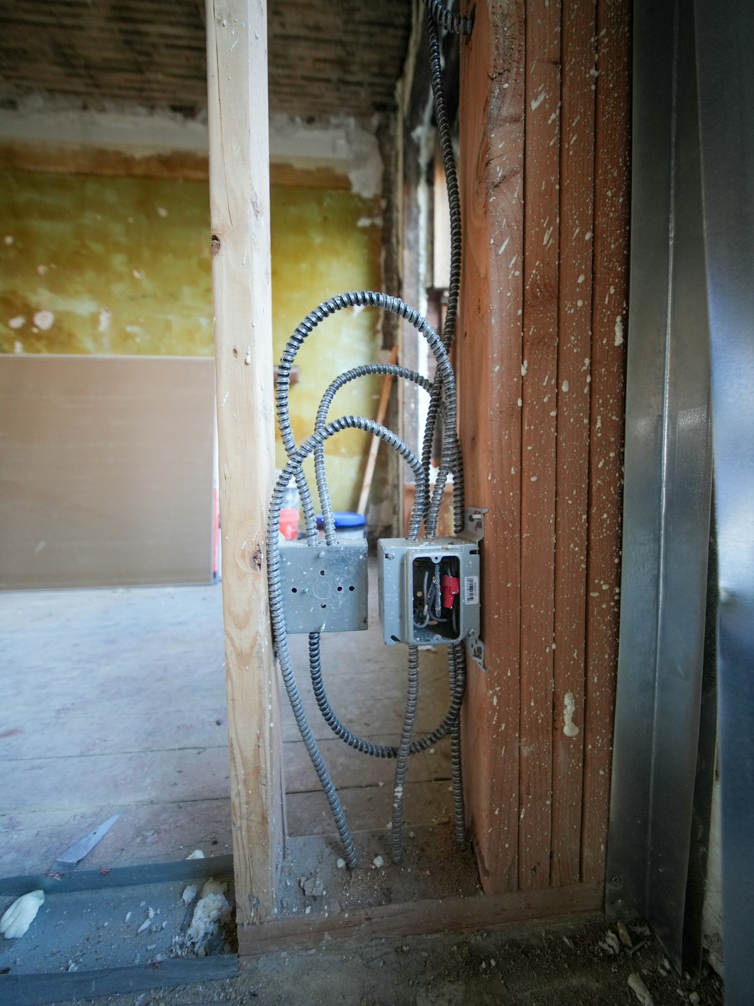 A three-story brownstone stands in mid-transformation, captured at the raw and honest “before” stage of a full interior renovation. These images document a moment that usually disappears once the walls are closed and the finishes are installed — exposed framing, stripped ceilings, rough staircases, and open corridors that reveal the building’s original structure and hidden history. Light spills in through skylights and tall windows, cutting through layers of dust and unfinished surfaces, creating a quiet contrast between decay and renewal. The space feels both industrial and intimate: narrow